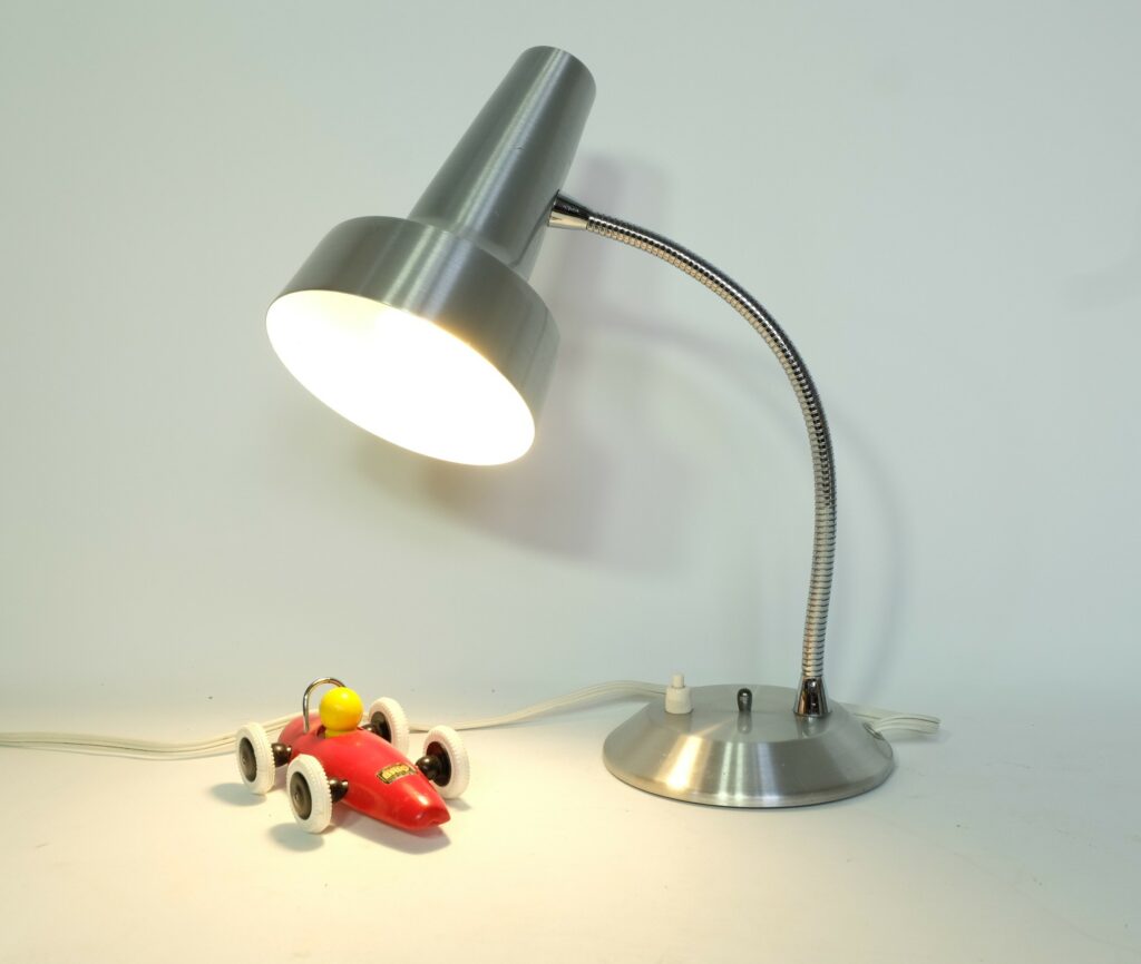 Silver Aluminum Table Lamp Function In Form