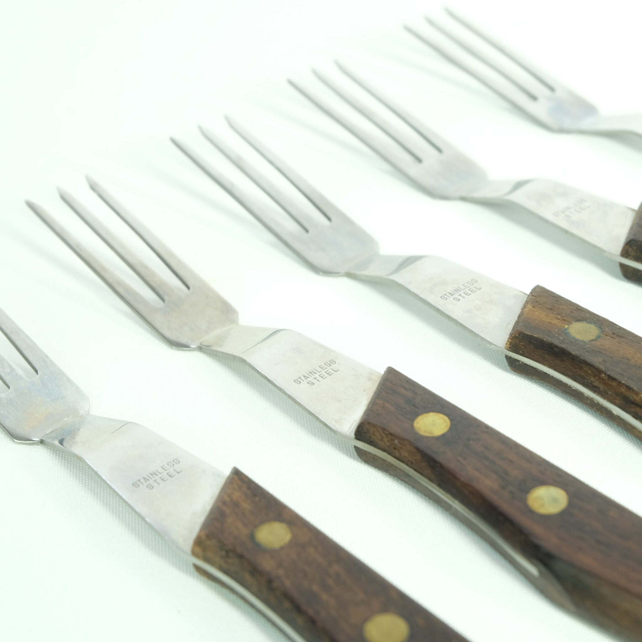 Set Five Stainless Forks Function In Form